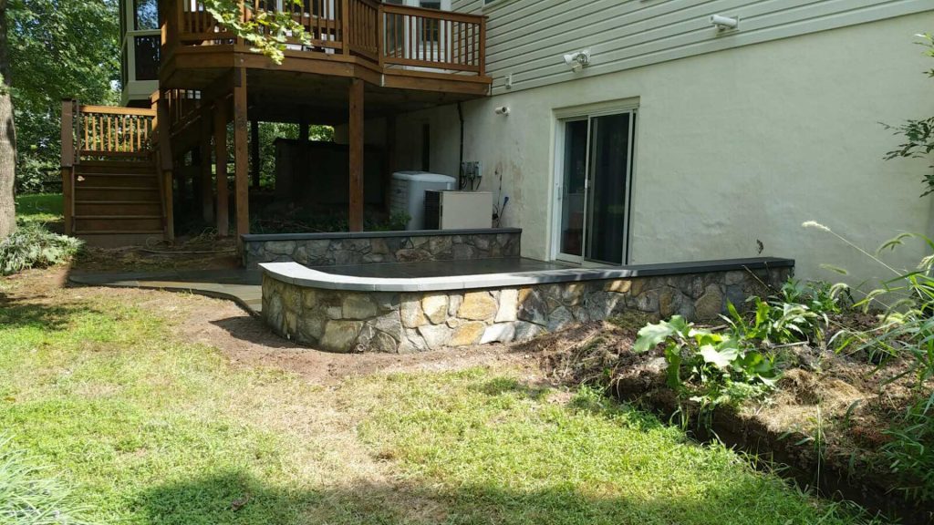 patio-with-stone-wall-1024x576