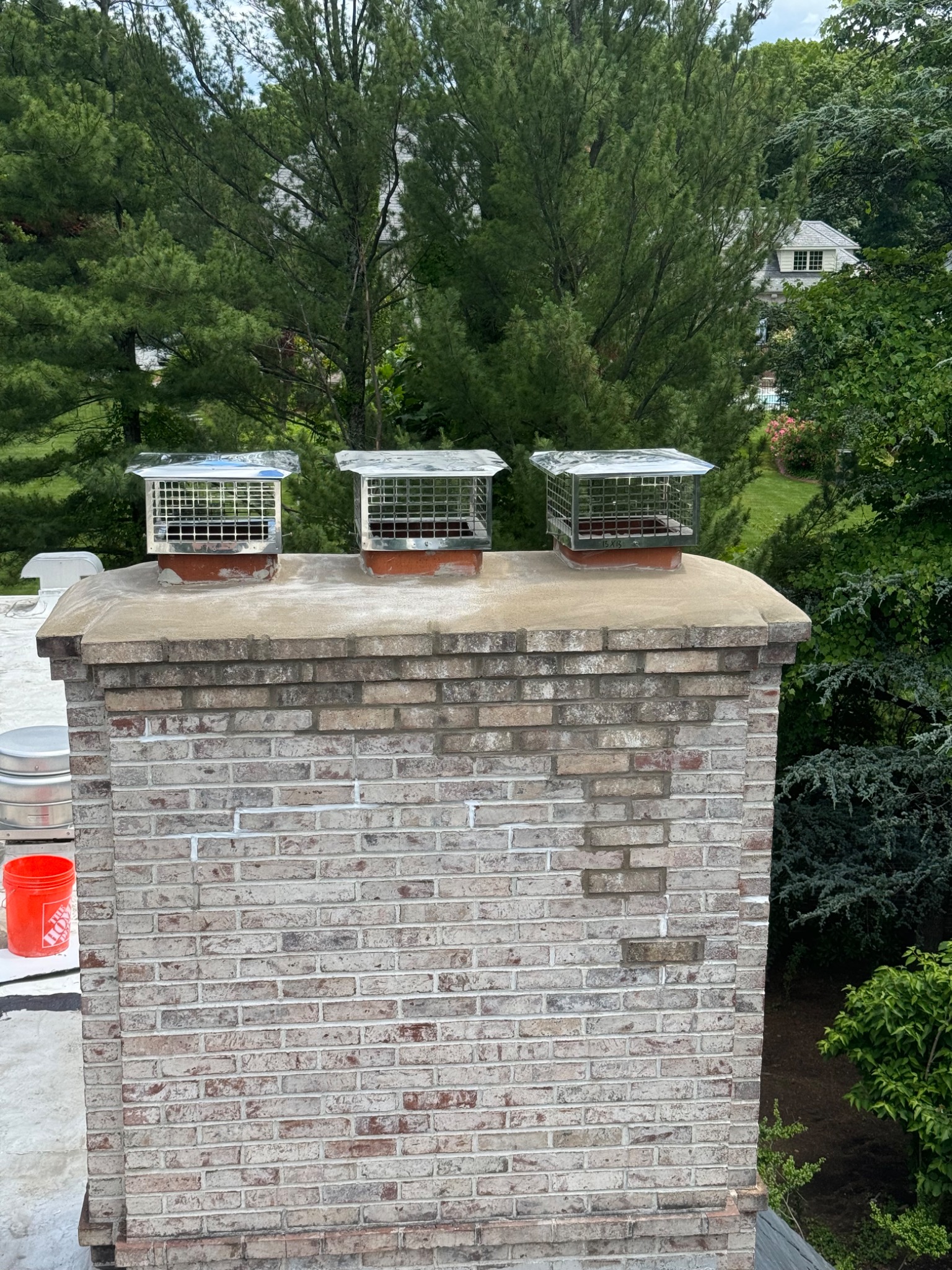 Multi-flue brick chimney from Golden Master's chimney project gallery